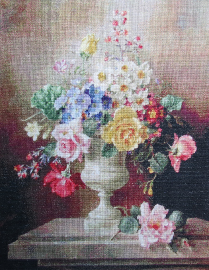 A still life study of roses, forget-me-nots and other flowers in an urn, resting on a stone ledge
